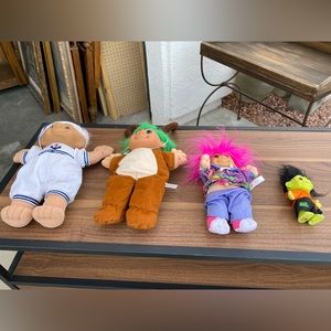 4 Adorable vintage troll dolls